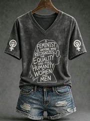 Women's "A feminist is anyone who recognizes the equality and full humanity of women and men" V-neck T-shirts